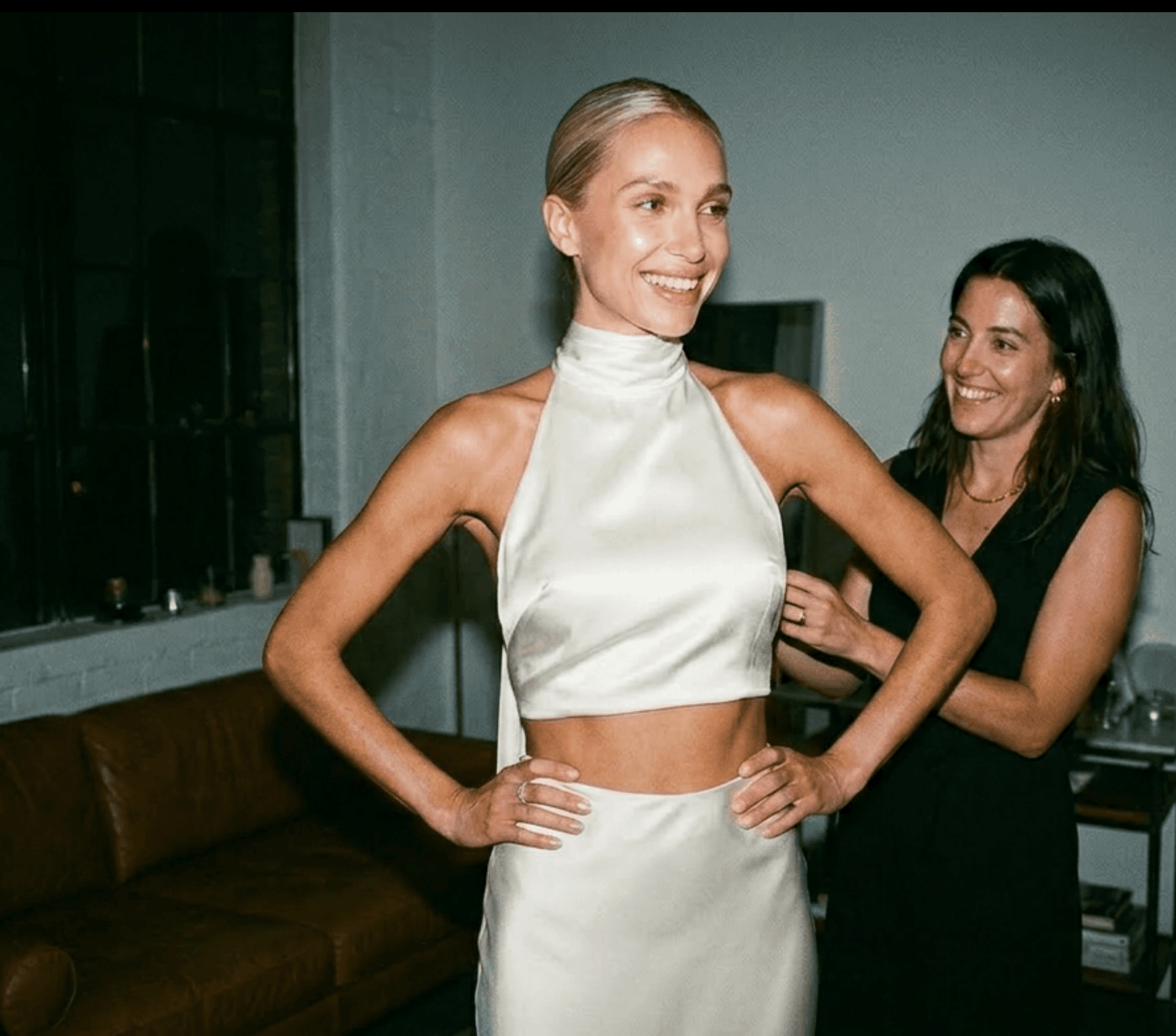 Bride trying on a gown